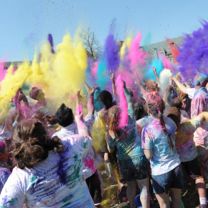 The event culminated in the runners gathering in a circle to throw colored powder in the air ... and each other.