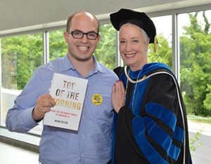 Brian Stelter '07 with President Maravene Loeschke at this spring's Commencement ceremonies.
