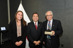 From left, student Samantha Figueroa, Panama Ambassador to the United States Mario Jaramillo and TU Associate Provost James DiLisio.