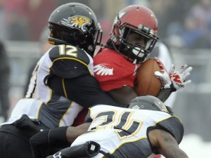 Towson's Alexander DiSanzo and Tye Smith take down Eastern Washington's running back in the semi-final game. (Photo: James Snook, USA Today Sports)