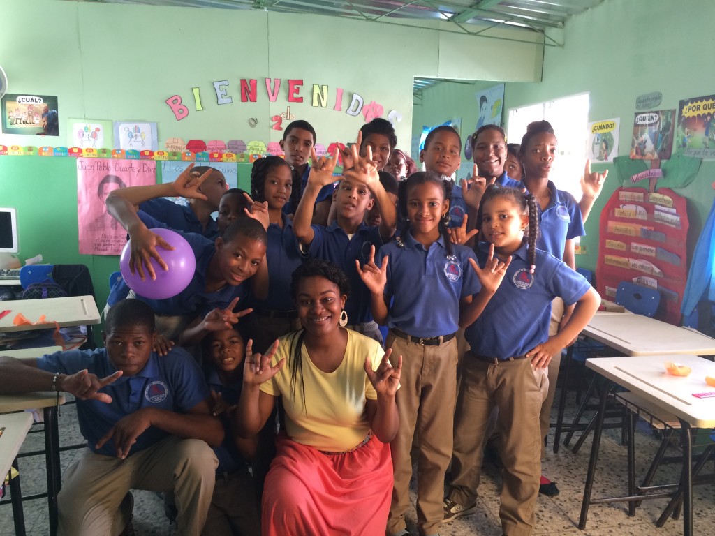 Gara Gabriel (center) poses with students at school for the deaf in the Dominican Republic. Gabriel was one of several students to make the trip during Spring Break. 