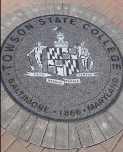 The seal for Towson State College - one of five seals inlaid in the Legacy Walk.