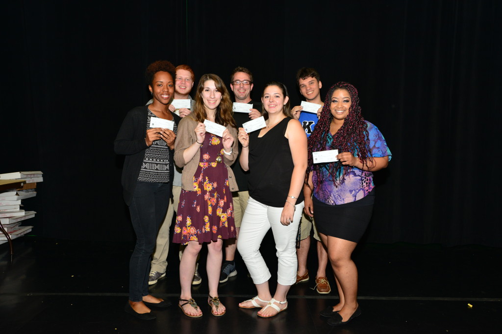 Towson University students display their winning checks for their audio and video PSA entries for the Maryland Vehicle Theft Prevention Council and Maryland DC Anti-Car Theft Committee. 