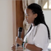 Still from a vimeo about the iDebate Rwanda program of a female debater