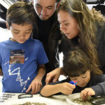 A family looks at fossils